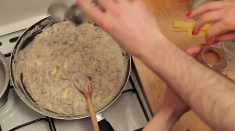 Adding Spices to meal Stock Footage 25618430