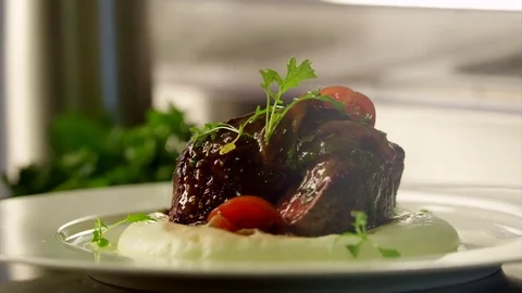 Adding spices to meat in slow motion Stock Footage 73605519