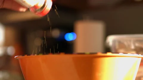 Adding spices to a Salad Stock Footage 58618352