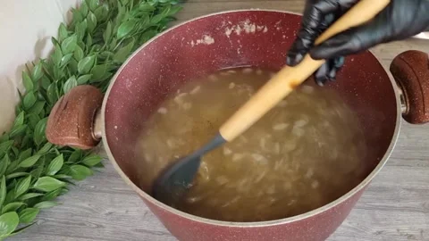 Adding Spices to Soup and Stirring | Homemade Cooking Process Stock Footage 344946989