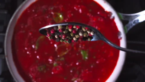 Adding spices to the tomato sauce closeup in super slow motion 1000fps Stock Footage 257061868