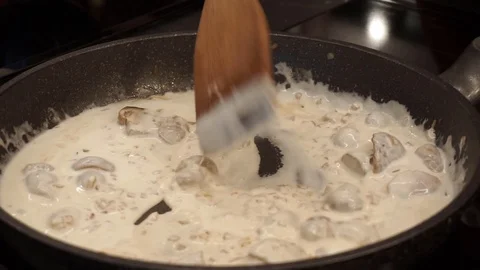 Adding spinach Stock Footage 113527157