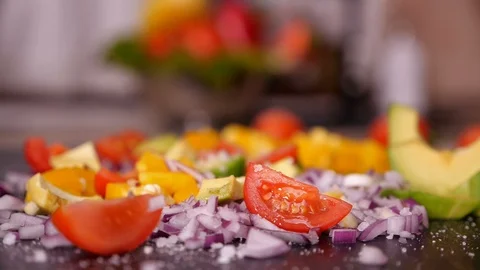 Adding sprouts to vegetables mix - closeup, slow motion Видео 101633538