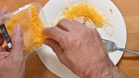 Adding spun egg to the pate Stock Footage 228220987