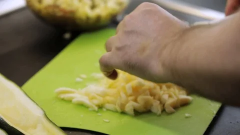Adding squash flesh to minced meat Stock Footage 119781201