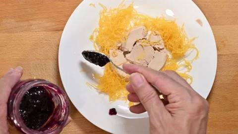 Adding strawberry jam to the pate Stock Footage 228221201