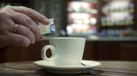 Adding sugar in coffe Stock Footage 44549390