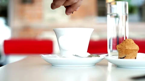 Adding sugar to Coffee Stock Footage 45772582