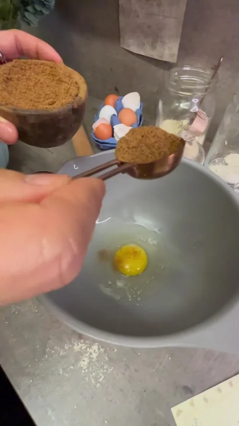 Adding Sugar to Egg for Cookie Dough Stock Footage 303823221