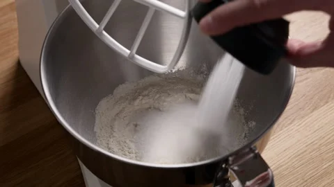 Adding Sugar To Stand Mixer Bowl Stockbeeldmateriaal 332840566