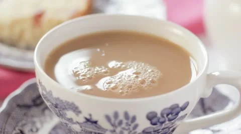 Adding sugar to tea Видео 10804722