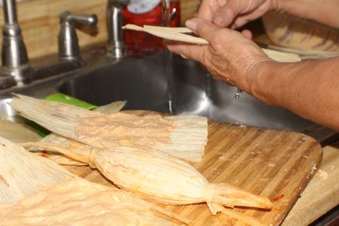 Adding Tamale Ingredients Foto stock