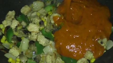 Adding Tikka Sauce Stock Footage 46987430