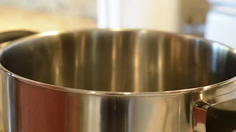 Adding Tomato Puree to Pot Stock Footage 136059340
