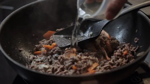 Adding tomato sauce closeup Stock Footage 97411184