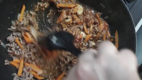 Adding tomatoes Stock Footage 97410781