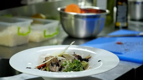 Adding Tomatoes to Grilled Meat Video stock 131636559