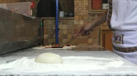 Adding topping on pizza Stock Footage 12274287