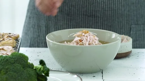 Adding Toppings on Korean Noodles Stock Footage 334280138