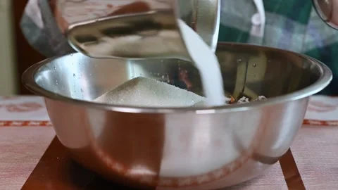 Adding ugar into fresh rinsed siberian pine cones, preparing homemade healing Video stock 242345626