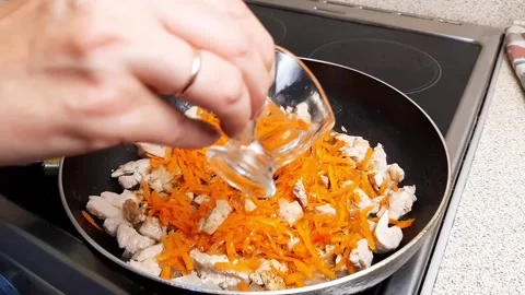 Adding Vegetable Oil to Goulash - Cooking Process Stock Footage 253597562