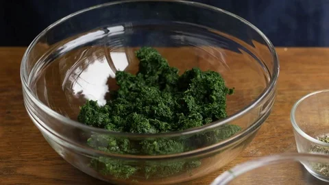 Adding walnut flour to spinach filling Stock Footage 71229458