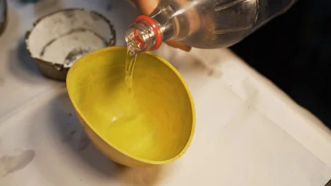 Adding water and plaster of parris to a bowl for mixing for dental Video stock 107753115