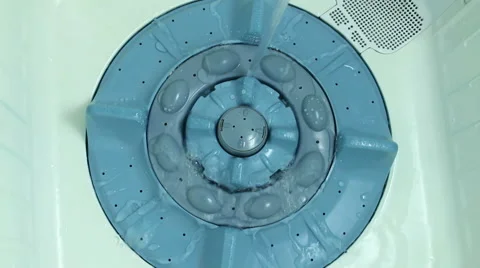 Adding water to the washing machine Stock Footage 48815381