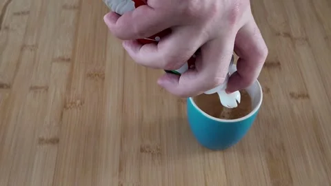 Adding Whipped Cream to a Cup of Coffee 스톡 동영상 347547932