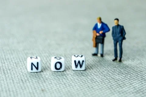 Adding white cube with letter w to the word no creating new word now on grey  Stock Photos