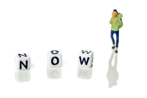 Adding white cube with letter w to the word no creating new word now on white Stock Photos