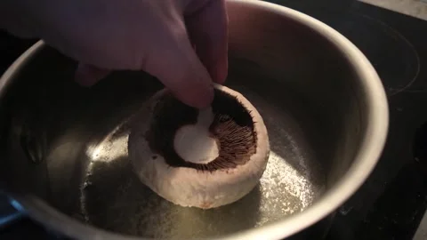 Adding Whole Button Mushrooms to Melted Butter Video stock 347548020