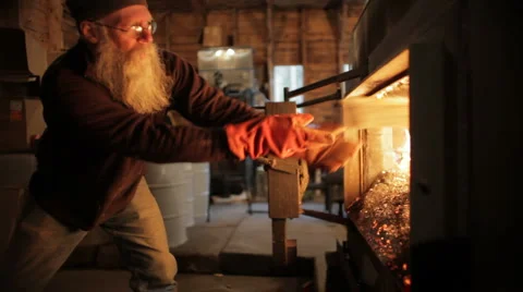 Adding Wood to Maple Sap Evaporator-Wide Shot Stock Footage 5502453