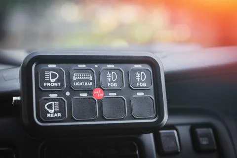 Additional dashboard panel in the car interior to control outdoor custom Stock Photos