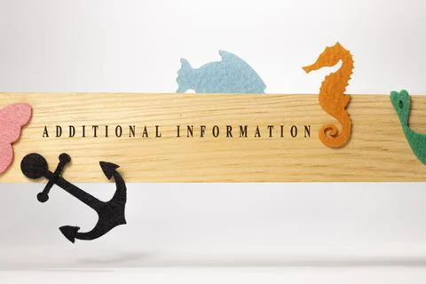 Additional information is written on a wooden patterned surface. Education an Stockfoto's