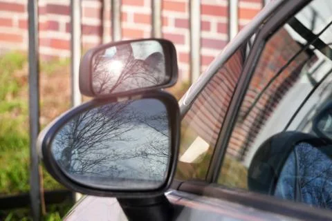 Additional mirror to the side-view for car to improve visibility or safety. U Stock Photos
