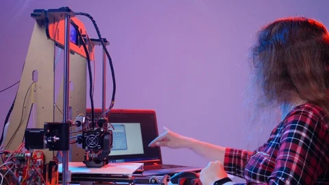 Additive technology and 3D printing concept. Woman Architect Using 3D Printer Stock Footage 119352973