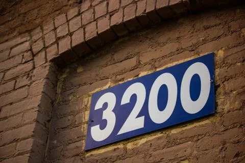 Address on Old Brick Building Stock Photos