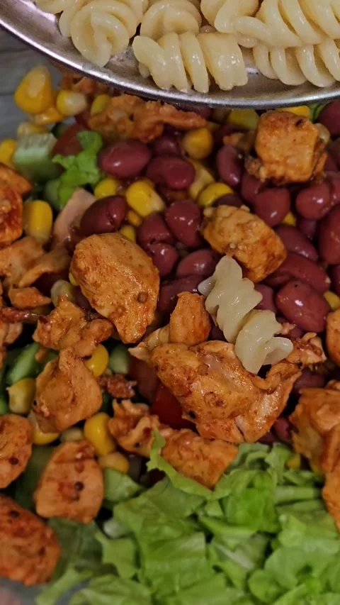 Adds pasta shells to the salad. Pasta Shells with Meat, Corn, and Beans Recipes Stockbeeldmateriaal 289631208