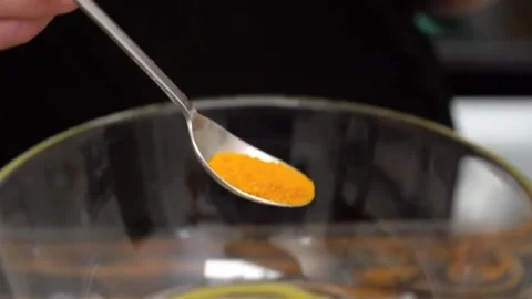 Adds spices to the dough Stock Footage 156693273