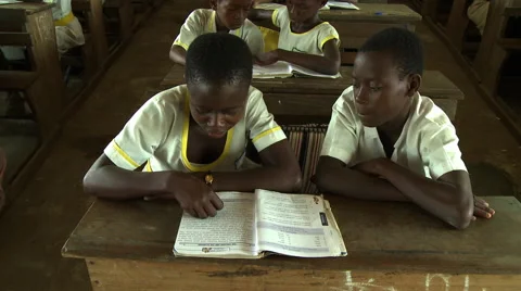 ADEISO CLASSROOM STUDENTS READING Stock Footage 57982591