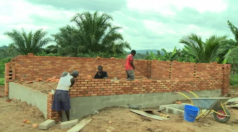ADEISO MEN BUILDING SANITATION FACILITY Stock Footage 57981283