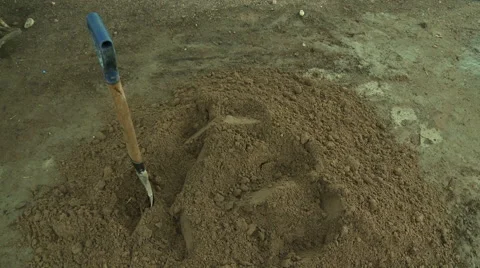 ADEISO PILE OF DIRT WITH SHOVEL Stock Footage 57982779