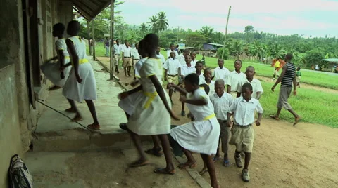 ADEISO SCHOOL CHILDREN MARCH INTO SCHOOL Stock Footage 58067320