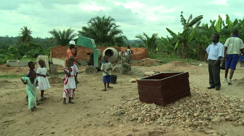 ADEISO STUDENTS IN FRONT OF SANITATION FACILITY Stock Footage 57981569