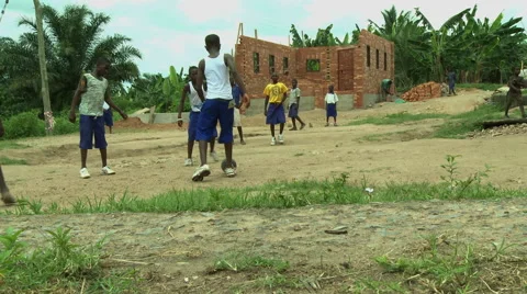 ADEISO STUDENTS PLAY SOCCER (BOY KICKS BALL) Stock Footage 58069144