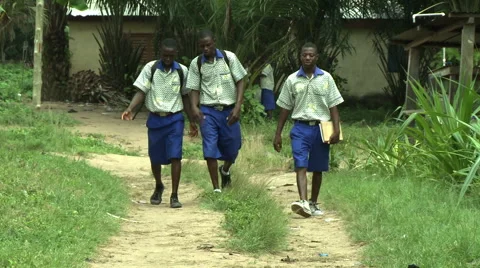ADEISO STUDENTS WALK UP PATH Stock Footage 58069380
