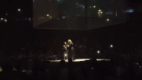 Adele invites impressive young fan onstage to perform in Manchester Video stock 109393490