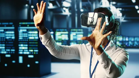 Adept developer using VR in data center Stock Footage 250294242