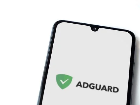 AdGuard app launch screen on smartphone on white background Stock Photos